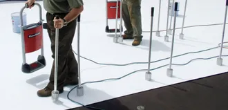 Step 3 - The RhinoBond® machine and magnets weld the membrane to each plate